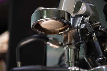 This series of close-up images showcases the intricate details of a professional espresso machine, capturing the essence of a barista's craft. 