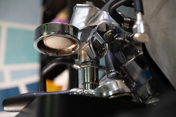This series of close-up images showcases the intricate details of a professional espresso machine, capturing the essence of a barista's craft. 