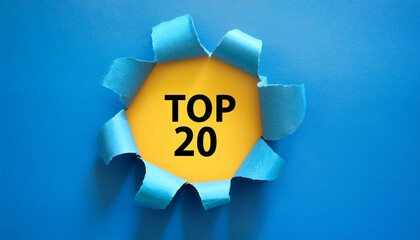 Torn paper revealing text Top 20, bright background. Business concept