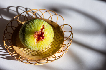 Close-up of fig on the table.