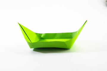 Paper colored boat isolated on white background. origami crafts. transport concept. origami.