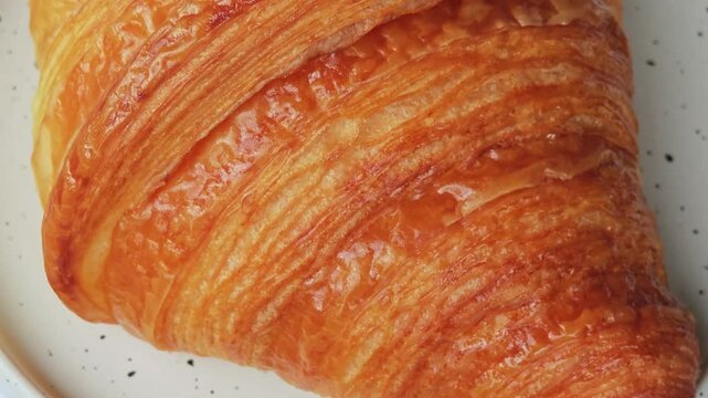 Freshly croissant. French pastry croissant rotation.