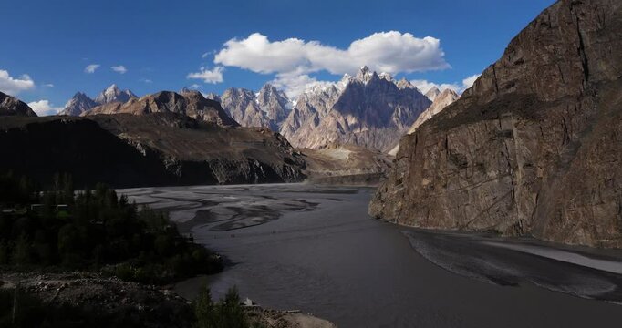 Beautiful Establishing Drone Shot - Hussaini Suspension Bridge. Passu Cones, Pakistan Tourist Destination. Zipline