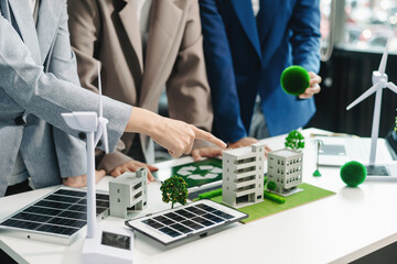 Business team people planning hand using laptop for working technology and business Net zero and...