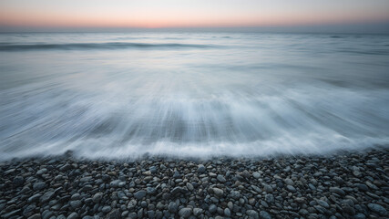 Serene Coastal View at Dawn with Gentle Waves