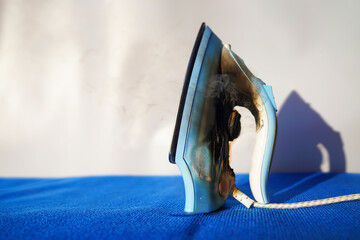 Electrical Short Circuit. Fire socket of electricity plug switch. Burning electric iron. Electric...