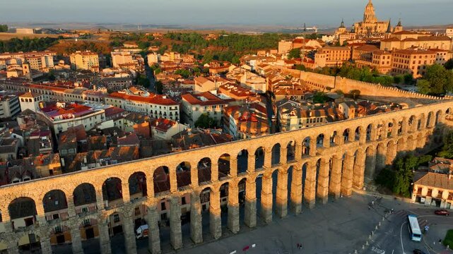 aerial Segovia, Spain, roman aqueduct of Segovia at sunrise, travel in Spain, medieval European town of Segovia in Spain, ancient architecture