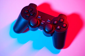 Game controller, video game joystick or gamepad control on a colorful background, close-up