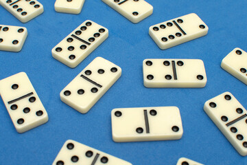 Dominoes bones on blue background	