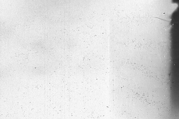 Distressed black texture. Dark grainy texture on white background. Dust overlay textured. Grain paper noise particles. Rusted white effect. Grunge design elements, image background