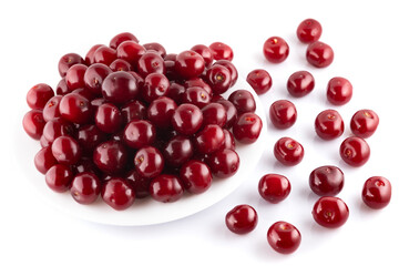 Ripe red cherries on plate isolated on white background