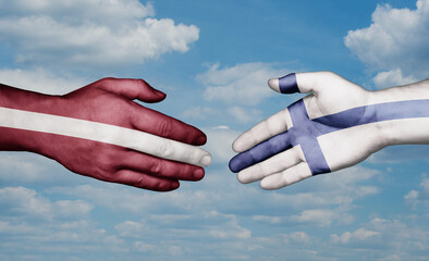 Finland and Latvia country handshaking