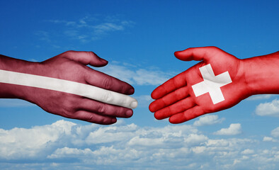 Switzerland and Latvia country handshaking