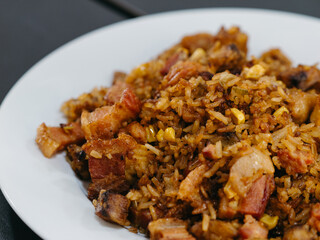 A plate with rice and meat