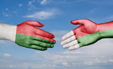 Madagascar country handshaking with flags, consensus concept international co-operation illustration