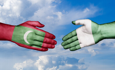 Nigeria and Maldives country handshaking with flags, consensus concept international co-operation illustration