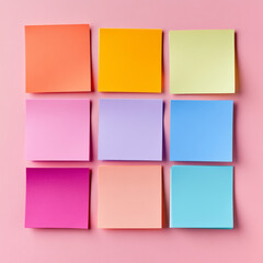 Colorful sheets for sticky notes on pink background 