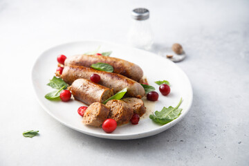 Homemade sausages with spinach and cranberry