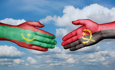 Mauritania and Angola country handshaking with flags, consensus concept international co-operation illustration