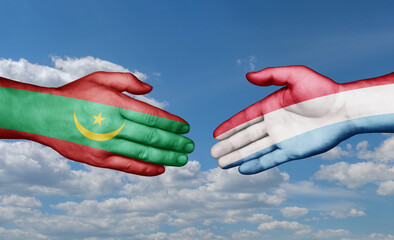 Luxembourg and Mauritania country handshaking with flags, consensus concept international co-operation illustration