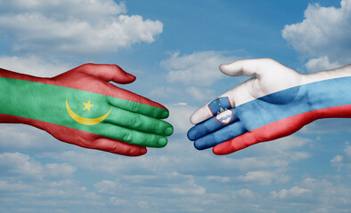 Slovenia and Mauritania country handshaking with flags, consensus concept international co-operation illustration