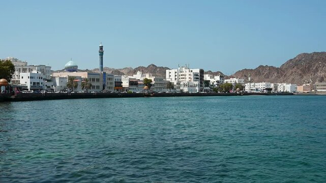 Panoramic view of Muscat Muttrah district with waterfront, traditional architecture in Oman. Video 4k resolution. 