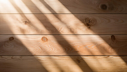 Top view wooden surface for a clean and modern boho farm house look with window light, shadows and plants. Background for product display.