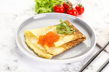 Russian pancake with red caviar