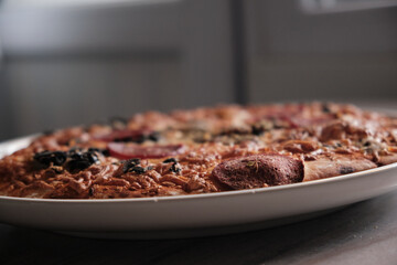 Homemade Italian pizza in close-up	