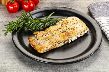 Baked salmon fish served rosemary