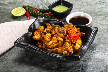 Vietnamese cuisine - fried frog with vegetables