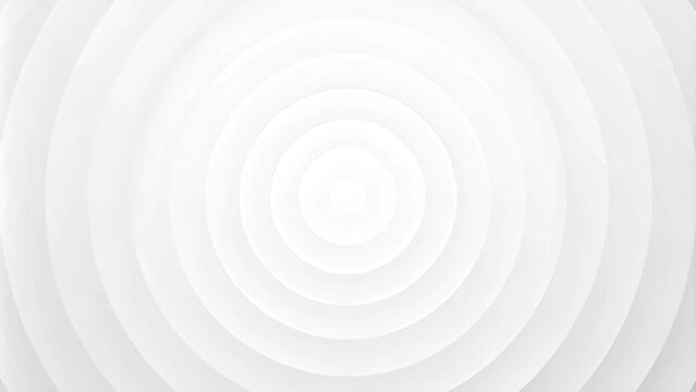 Concentric randomly offset white rings or circles steps fading out background wallpaper banner, close up flat lay top view from above. abstract modern minimal white background