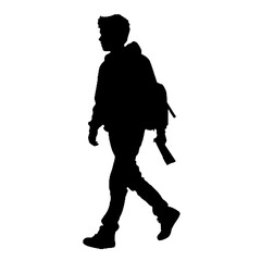 silhouette of a person with a backpack