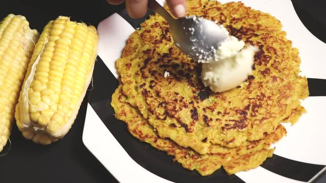 Makki ki roti(Maize bread) is a flat unleavened bread made from corn flour with a fresh white butter.