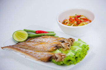 grilled fish with lemon and chili with mango sause 