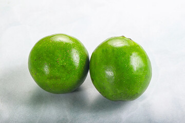 Two ripe green exotic avocado fruit