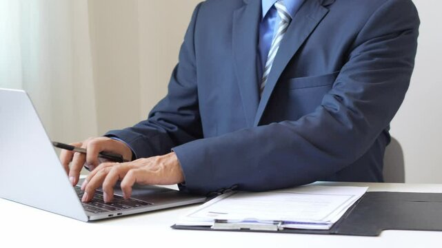 Business man employer holding resume hiring recruit looking cv resume to hire candidates, analyzing information before job interview. Recruitment concepts.