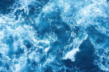 Fototapeta premium The image is of a large body of water with a lot of waves