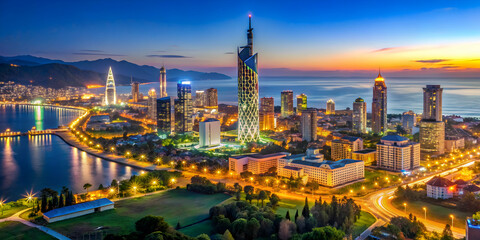 Fototapeta premium Night panorama view of the city of Batumi , Batumi, Georgia, cityscape, urban, night, skyline, illuminated, lights