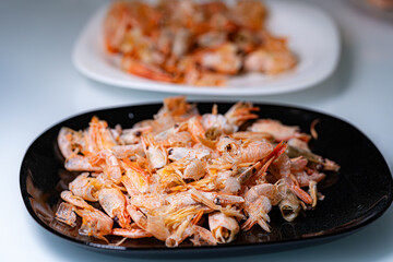 Shrimp seafood platter with sides.