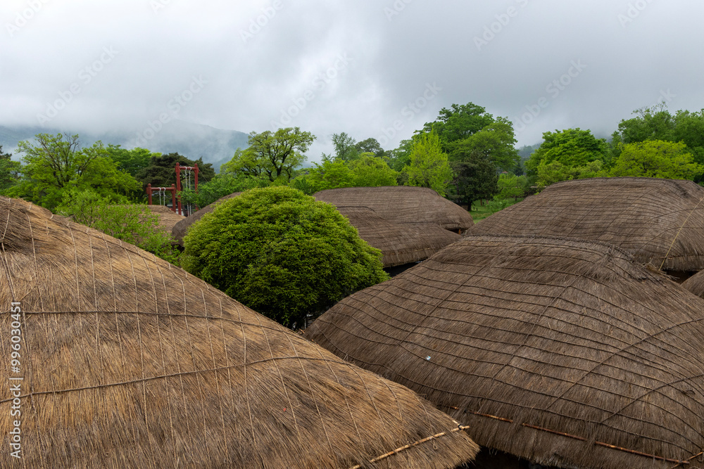 Sticker  landscape with clouds and Thatched house