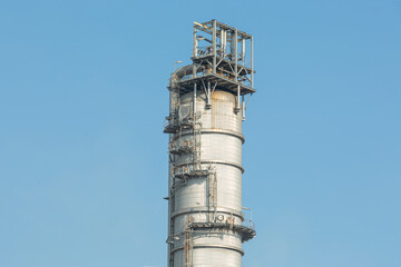 White oil tank storage chemical petroleum petrochemical refinery product at oil terminal. Oil terminal storage tank in deep seaport for the international order concept.