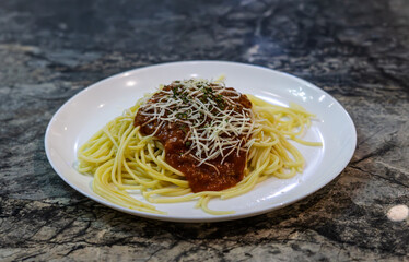 Spaghetti bolognese that looks appetizing with its luxurious pasta and signature sauce. Spaghetti bolognese itself is a typical Italian pasta dish with the addition of sauce made from tomato paste, mi