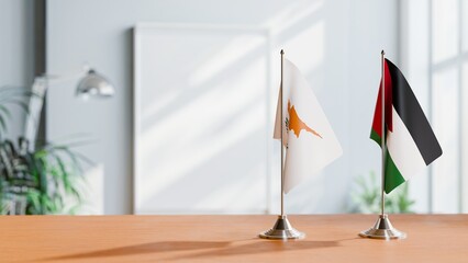 FLAGS OF CYPRUS AND JORDAN ON TABLE