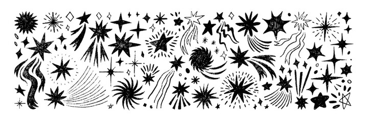 Crayon drawn stars and comets. Set of graphic doodle sparks and sparkles. Pencil or charcoal drawing.