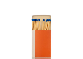 Wooden matches in a paper box for lighting a fire, macro, isolated on a white background.