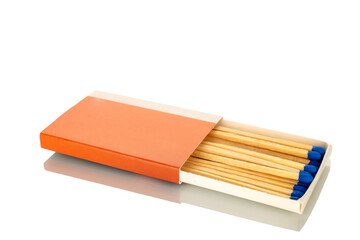 Wooden matches in a paper box for lighting a fire, macro, isolated on a white background.