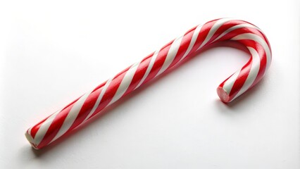 Fototapeta premium Single red and white candy cane is lying on a white background
