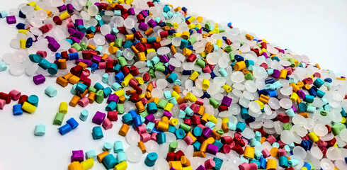 Red masterbatch granule, red polypropylene polymer granules, cold cutting type granule texture, isolated on white background, for industrial plastic company profile product catalog design