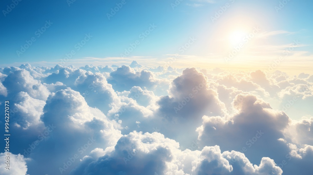 Poster a breathtaking view of fluffy white clouds against a deep blue sky, with sunlight streaming through,